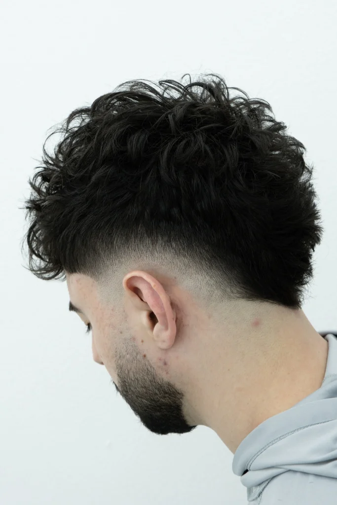 Top Short Curly Guy Hairstyles That Are Stylish and Easy to Keep 6 Curly Mohawk